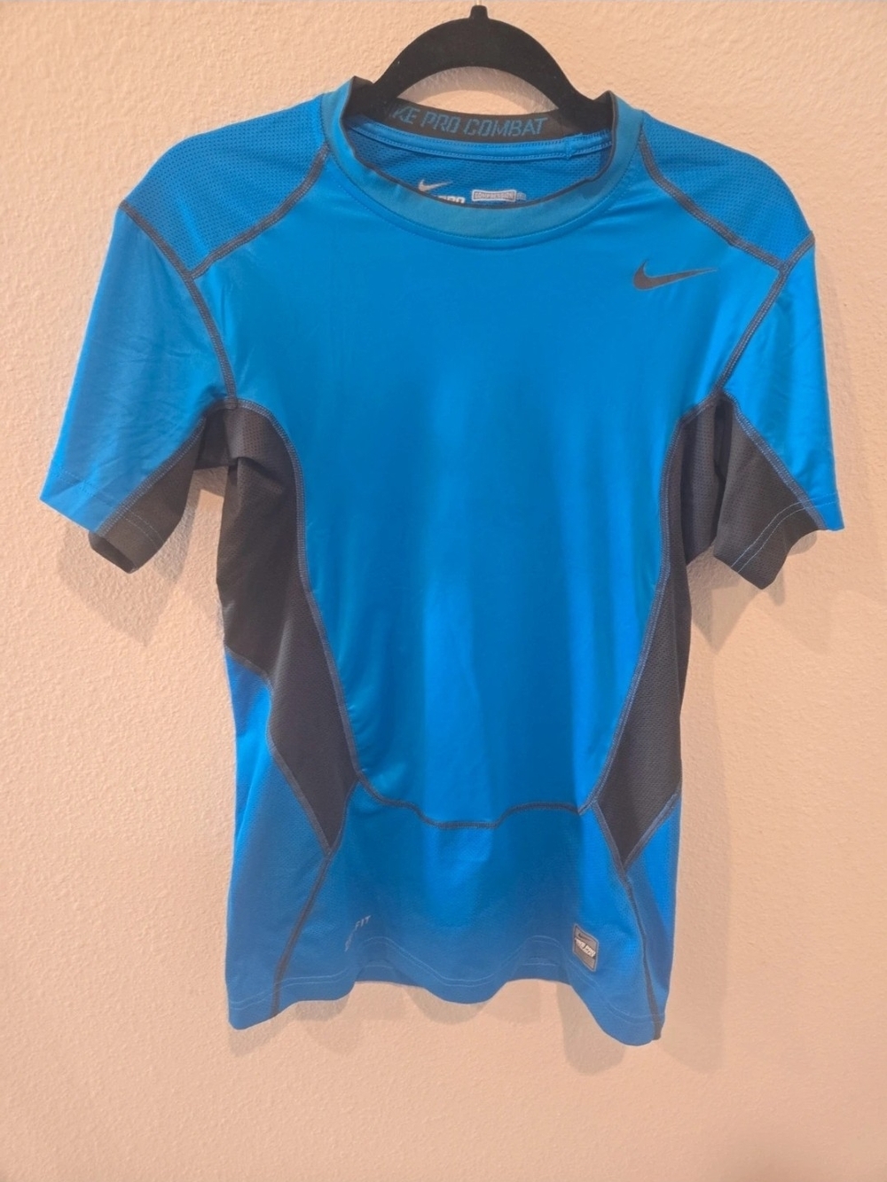 Nike Men's Blue Short-Sleeve Performance Shirt with Gray Panels